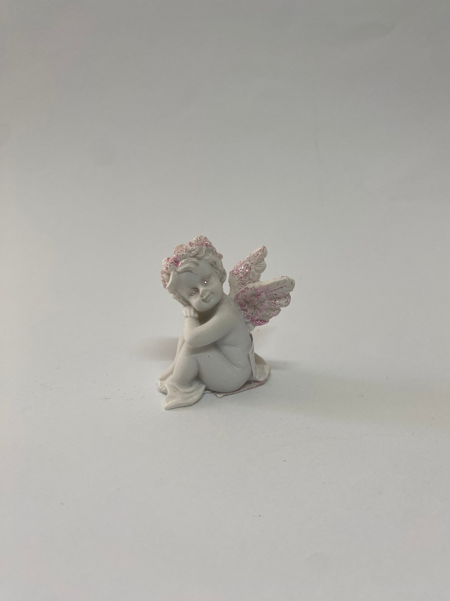 CHERUB SITTING W/PINK GLITTER 5CM ASST