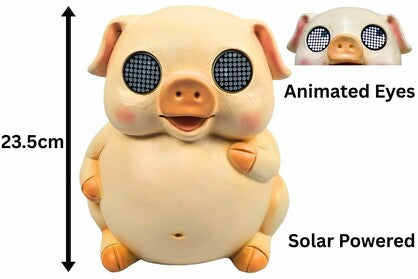 PIG W/SOLAR EYES 23CM